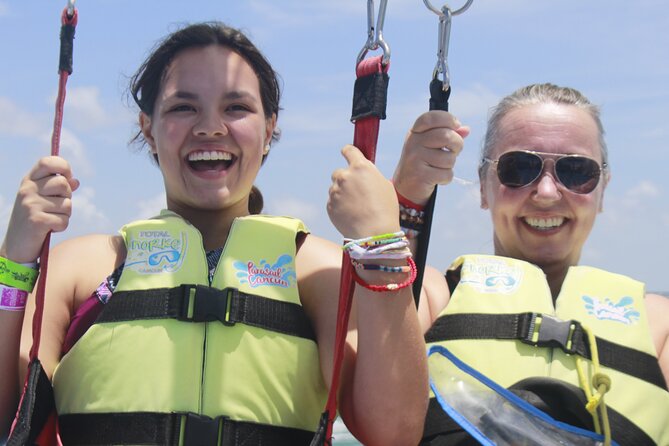 2 in 1 Parasailing and Jet Sky Tour in Cancun - Parasailing flight specifics: 10 to 12 minutes up at 80 to 90 meters