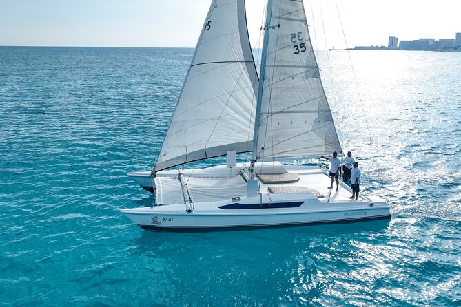 All-Inclusive Isla Mujeres Catamaran with Free Transportation - Entering the day at Playa Tortugas, Cancun