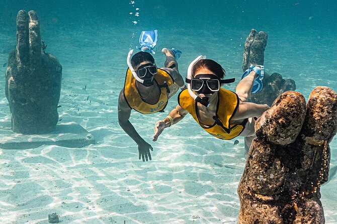 All-Inclusive Isla Mujeres Catamaran with Free Transportation - The Blanquizal sandbar swim stop, why it’s worth fitting in