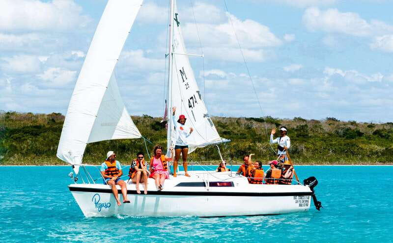 Bacalar: Group Sailing Trip with Swimming and Drinks - Isla de los Pájaros and Bird Island: When Photos Meet Reality