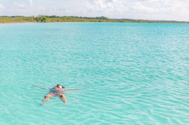 Bacalar: Group Sailing Trip with Swimming and Drinks - Cenote Negro: Short Stop, Good Photo Payoff