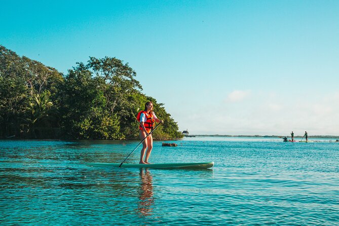 Bacalar Sunrise Stand Up Paddleboard Tour with Breakfast & Photos - Balneario Ecológico, the protected nature break, and a cenote-style swim moment
