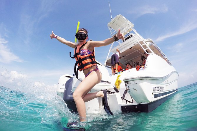 Beach Escape: Isla Contoy and Isla Mujeres with Snorkeling. - Flamingos and the quick snack stop that sets the tone