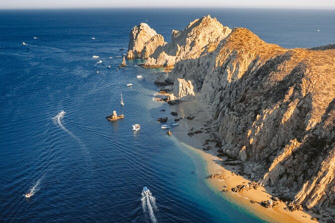 Cabo San Lucas Sunset Cruise with Open Bar and Snacks - The trimaran experience: open bar, snacks, decks, and onboard restrooms