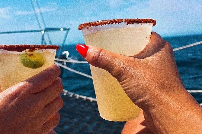 Cabo San Lucas Sunset Cruise with Open Bar and Snacks - Money and small gotchas: port tax, snacks, and diet needs
