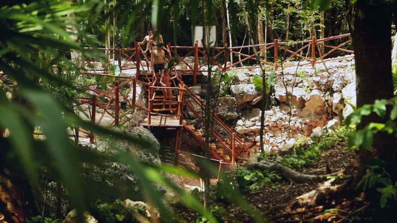 Cancún: Cenotes Adventure with Tequila Tasting & Mayan Snack - Zipline and jumping platform: adrenaline inside a lifejacket setup