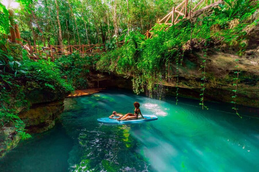 Cancún: Cenotes Adventure with Tequila Tasting & Mayan Snack - The first cenote stop: swimming in a sacred sinkhole system