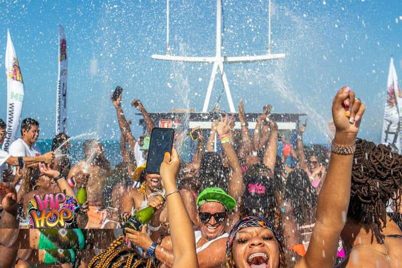 Cancun: Hip Hop Sessions Party Boat Cruise - The party rhythm: hosts, guest DJs, and sunset return