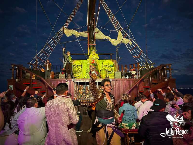 Cancún: Jolly Roger Pirate Dinner Cruise 2025 - Pirate show pacing: acrobatics, real steel weapons, and big stage effects