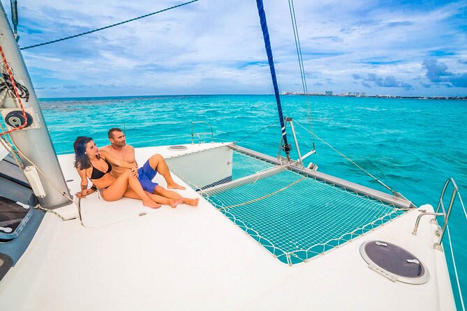 Catamaran to Isla Mujeres Snorkeling Tour with Open Bar and Lunch - Stop 1 at Marina Las Perlas Area: What That 30 Minutes Is For