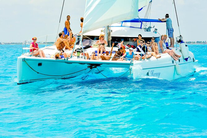 Catamaran to Isla Mujeres Snorkeling Tour with Open Bar and Lunch - The Beach Club Stop: Lunch, Relaxing, and How the Timing Feels