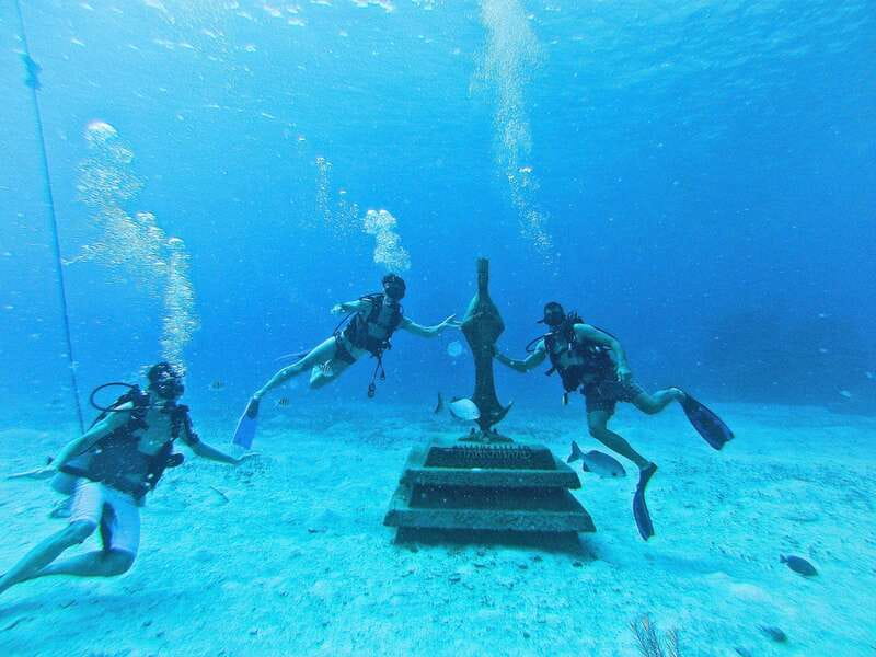 Cozumel: One Tank Scuba Dive and Full Chankanaab Park Access - Underwater expectations: caves, sculptures, reef life, and sea animals