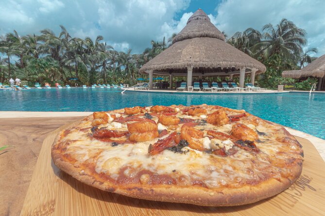 Cozumel: Paradise Beach Club All-Inclusive Day Pass - On-water add-ons: inflatables, banana boats, and parasailing costs