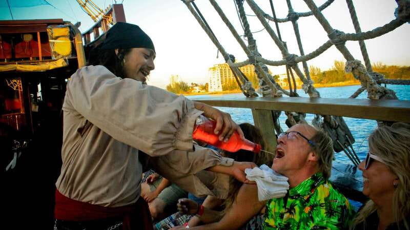 Cozumel: Pirate Ship Cruise with Open Bar, Dinner, and Show - The Pirate Show and Crowd Games: Sword Fights, Stories, and Participation