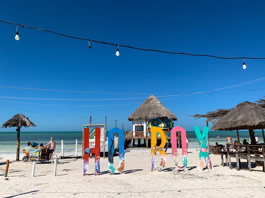 From Cancun or Puerto Morelos: Holbox Boat Tour with Lunch - Punta Mosquito photo stop: where the day finds its rhythm