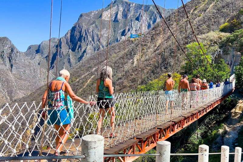 From Mexico City: Tolantongo Hot Springs Day Trip with Guide - Suspension bridge and trails: optional adventure that adds real views