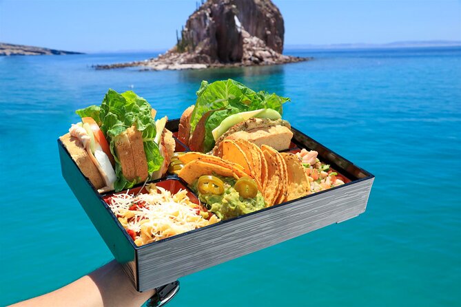 Half Day Cabo Snorkel Adventure with Lunch and Open Bar - The Arch of Cabo San Lucas, Land’s End, and sea lions