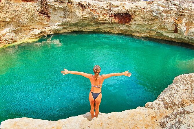 Hidden Cenote Swim & ATV Jungle Adventure with Transportation - Safety first, including when weather changes the plan