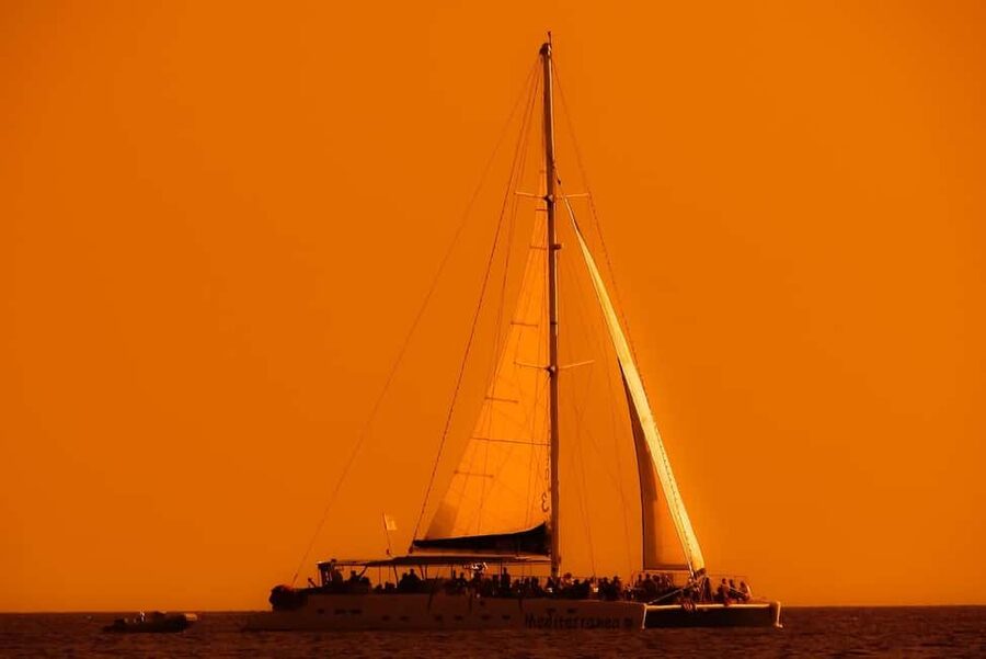 Isla Mujeres: Catamaran Ride with Open Bar, Snorkeling, and Lunch - Open Bar and On-Board Vibe: Music, Crew, and Drink Refills
