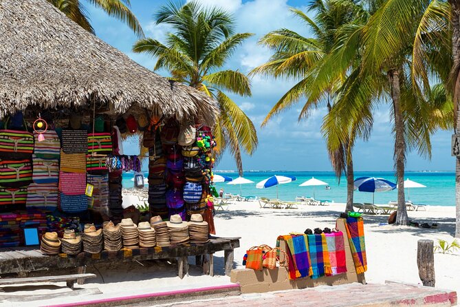 Isla Mujeres Catamaran Tour with Snorkel, Open bar and Transport - Stop 1 at Playa Tortugas: the warm-up you’ll feel before you sail