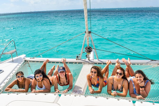 Isla Mujeres Catamaran Tour with Snorkel, Open bar and Transport - Playa Norte and Isla Mujeres town time: beaches, browsing, and the pacing