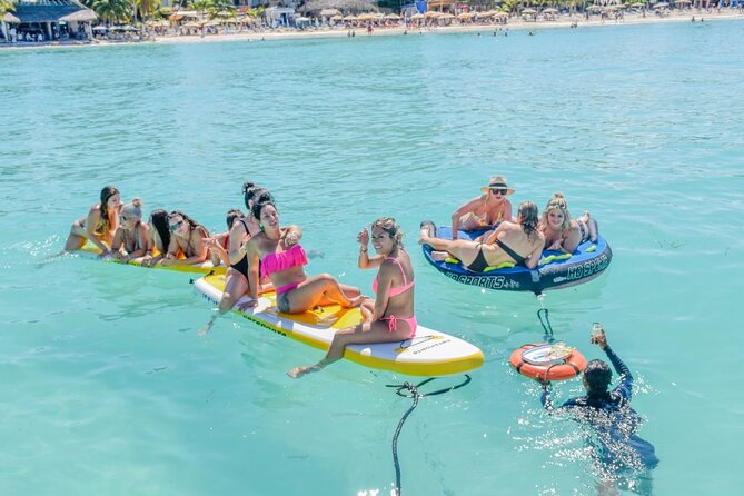 Isla Mujeres Catamaran Tour with Snorkel, Open bar and Transport - Transport, pickup zones, and how not to lose time