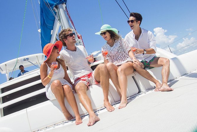 Isla Mujeres Luxury Sailing: Adults Only or Family Friendly - Onboard the Catamaran: Open Bar, Snacks, and the Snorkel Stop When Conditions Allow