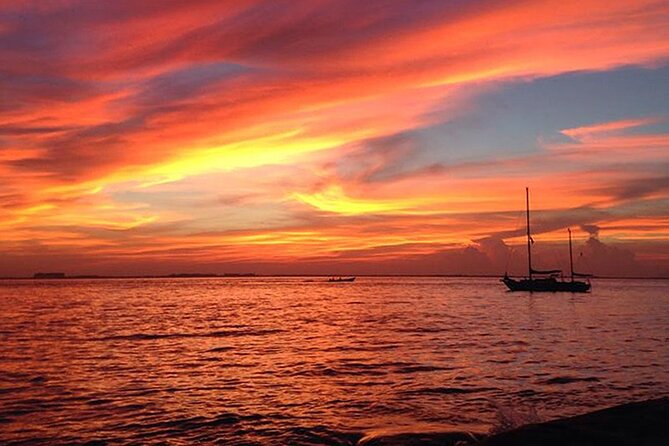 Isla Mujeres Sunset Cruise and Tour from Cancun - Isla Mujeres downtown: history stops, legends, and where time can slip