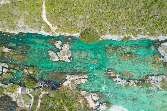 Magical Cenote and Paradise Lagoon Snorkeling Adventure - The Mayan cenote experience: darkness, cave chambers, and cold water reality