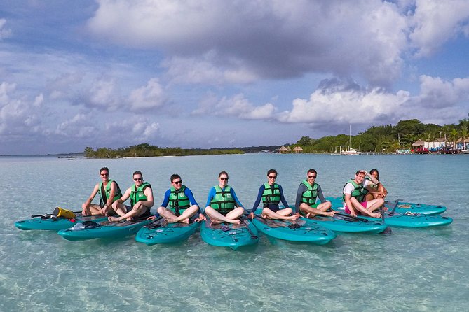 Paddleboarding and/or kayaking tour at sunrise in the lagoon of Bacalar - Cenote de la Bruja Stop: A Different Kind of Beauty on the Route