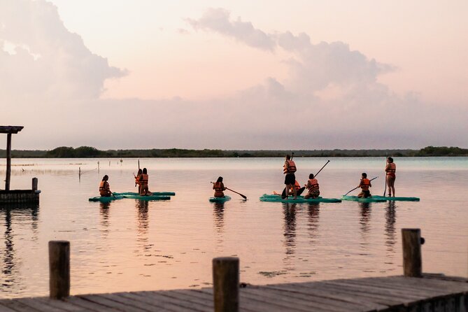 Paddleboarding and/or kayaking tour at sunrise in the lagoon of Bacalar - Meeting Point at Costera 599: Beat the Dark Confusion