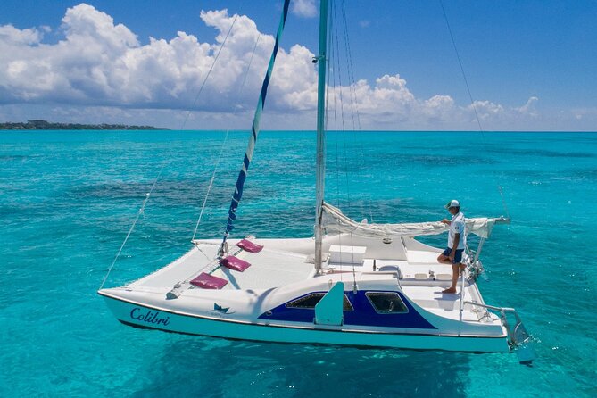 Premium Isla Mujeres Tour by Private Catamaran - Entering the day at Playa Tortugas (and why the 9:30 am start helps)