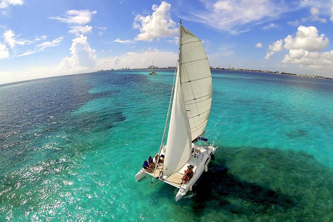 Private Catamaran from Cancun to Isla Mujeres for up to 13 People - Snorkeling on the reef with gear included and fewer crowds