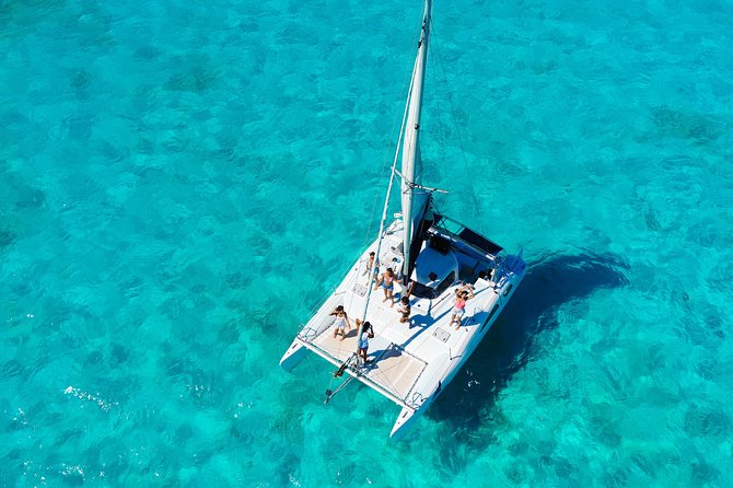 Private Catamaran from Cancun to Isla Mujeres for up to 13 People - Crew energy: Fernando, Captain Willy, and the hosts who handle the small stuff