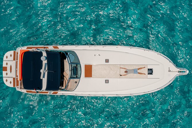 Private Luxury Yacht 55FT Rental in Cancun - What’s Included: Snorkel Gear, Ice, Soft Drinks, and the Lilly Pad
