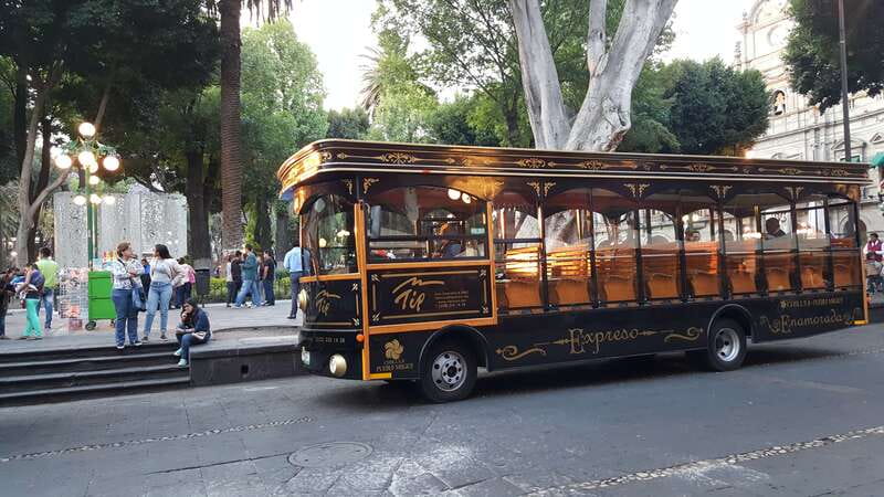 Puebla: Cholula Magical Town Tour by Double-Decker Bus - The Zócalo free time: market snacks, Royal Chapel, and a second look