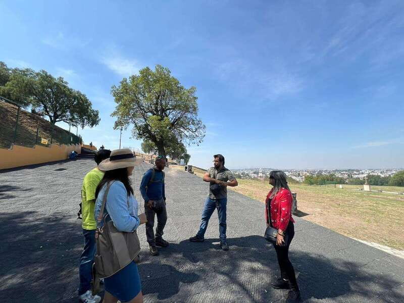 Puebla: Walking Tour of Puebla City - Analco area and the Puente de Ovando legend, plus a taste-stop mood shift