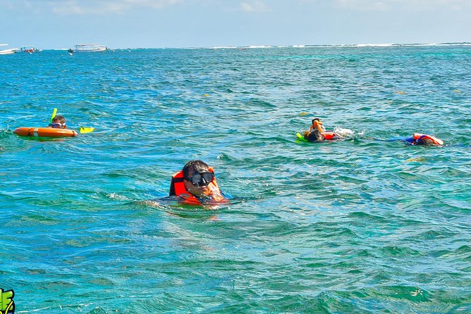 Reef Snorkeling in National Park from Cancun with Beachside Lunch - Reef-Friendly Rules: Phones, Sunscreen, Cameras, and Staying Together