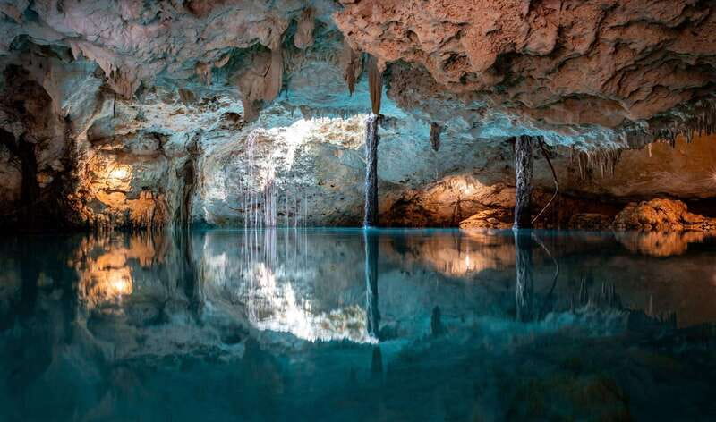 Riviera Maya: Tulum Ruins and 2 Cenotes Half-Day Tour - Inside Tulum: Frescoes, God of the Wind, and the photo stop you’ll actually use