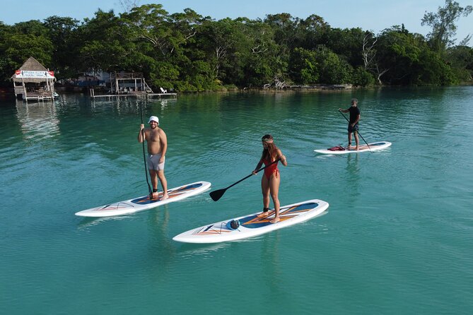 Sunrise on Paddleboard with breakfast in the lagoon of 7 colors - Black Cenote visit: seeing a different mood up close