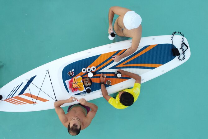 Sunrise on Paddleboard with breakfast in the lagoon of 7 colors - Breakfast on the water: coffee, fruit, and a sweet snack
