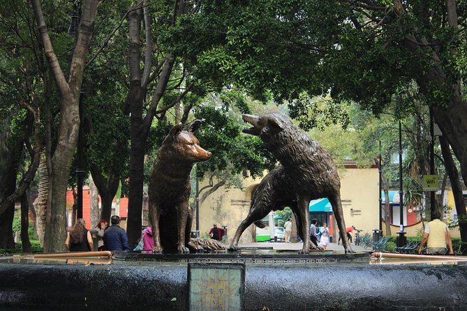 Teotihuacan & Guadalupe Shrine + Xochimilco, Coyoacán & Frida Kahlo Combo Tour - UNAM Central Campus: a short mural stop with big art names