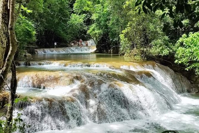 Tour to Copalitilla Magical Waterfalls from Huatulco with admission included - Stop 1 at Cascadas Magicas de Copalitilla, Walk, Swim, Explore