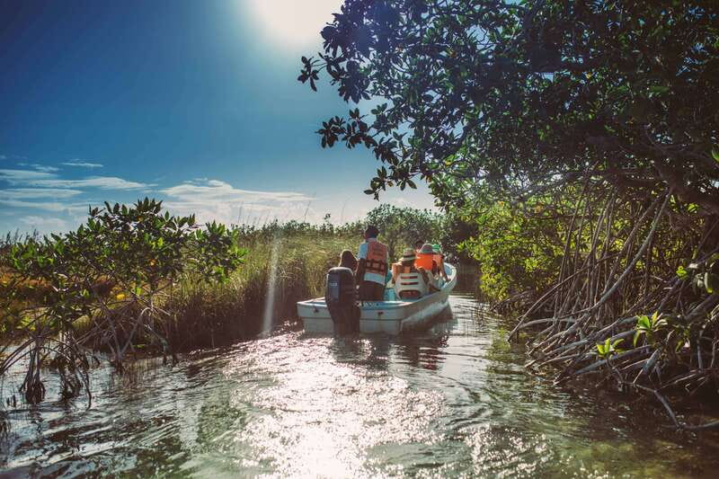 Tulum: Mayan Ruins & Sian Kaan Tour with Boat Ride and Lunch - Entering the Archaeological Zone of Tulum With a Guide Who Points Things Out