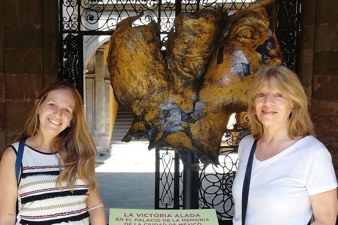Walking Tour of the Historic Center of Mexico City - Palacio de Bellas Artes and Palacio Postal: big art moments, then economics in architecture
