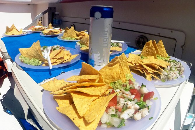 Whale Shark Tour from Cancun, Playa del Carmen, Tulum and Riviera Maya - The Isla Mujeres Playa Norte stop: lunch, warm water, and downtime